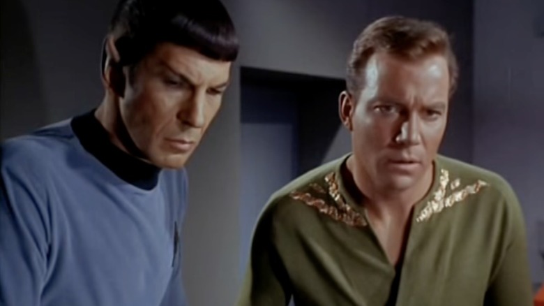 Kirk and Spock looking concerned