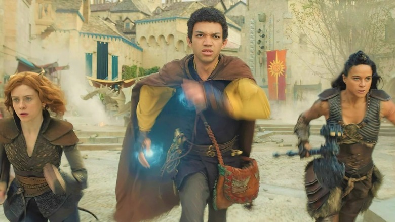 Sophia Lillis, Justice Smith, and Michelle Rodriguez charge into battle