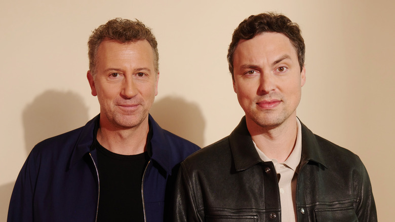 Jonathan Goldstein and John Francis Daley posing for a photo