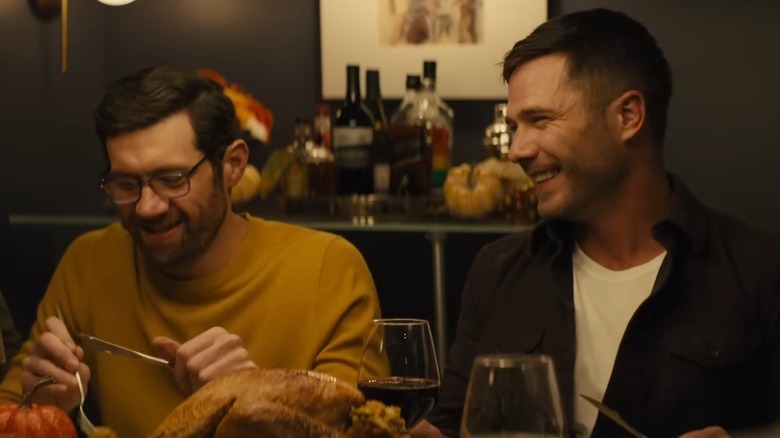 Bobby Lieber and Aaron Shepard laughing at a dinner table