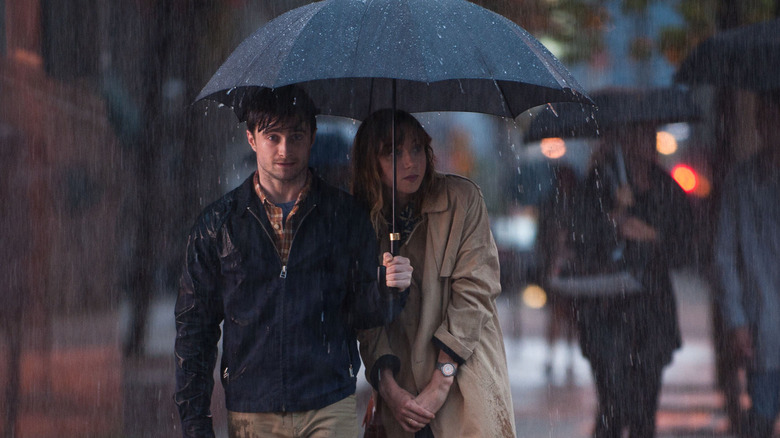 Daniel Radcliffe and Zoe Kazan in the rain