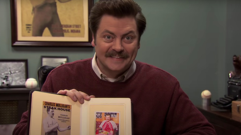 Ron holding his steak scrapbook