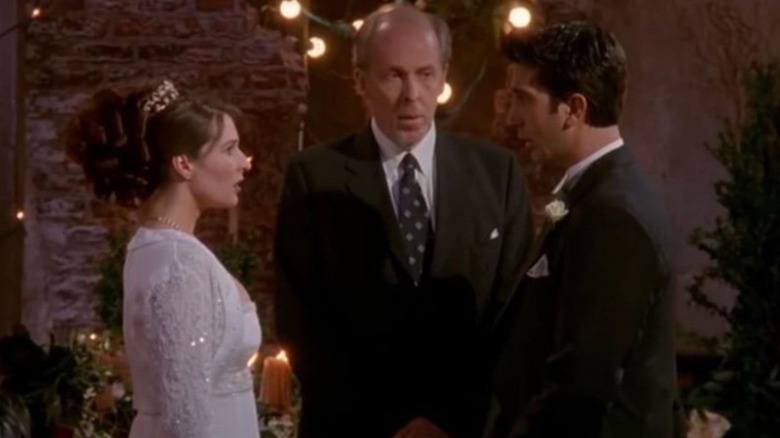 Ross and Emily at the altar