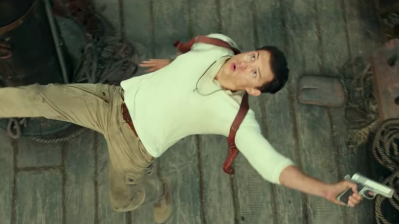 Tom Holland in action in "Uncharted" still