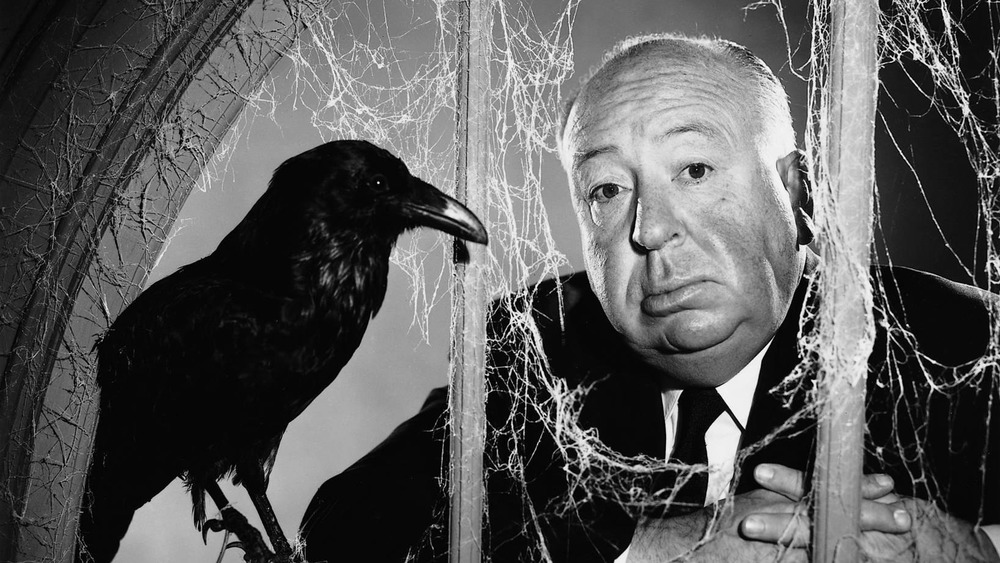 Alfred Hitchcock with a bird