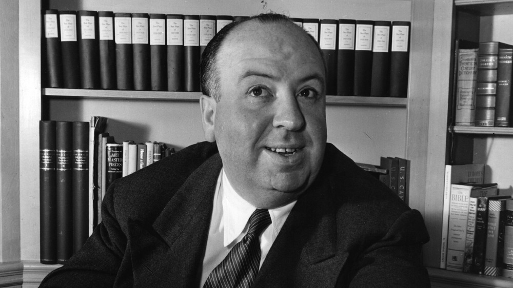 Alfred Hitchcock and bookshelf