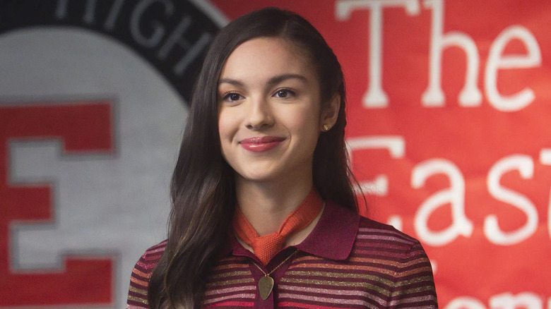 Nini smiling in "High School Musical: The Musical: The Series."