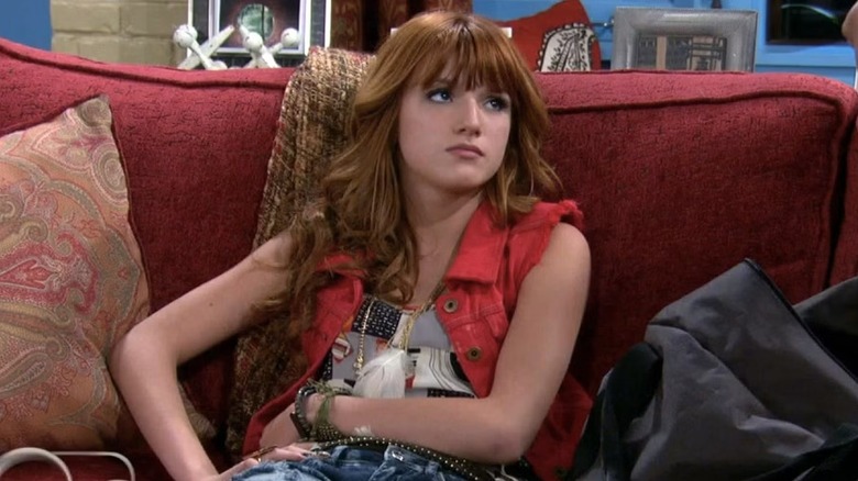 Cece frowning while sitting on a couch in "Shake It Up."