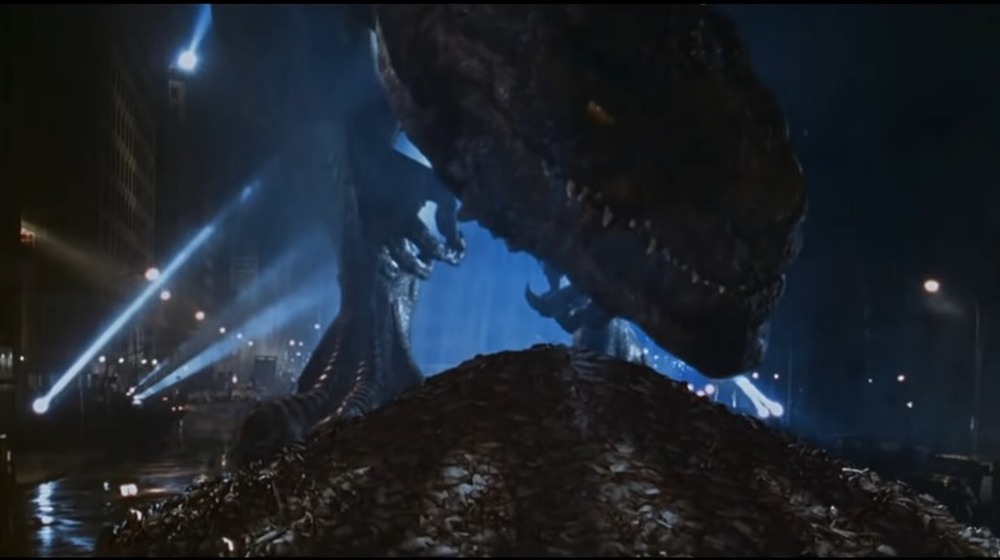 godzilla sniffing fish pile