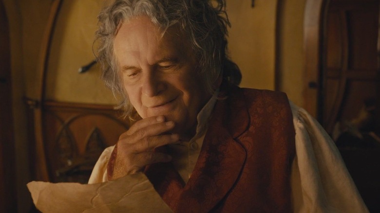 Bilbo Baggins writing his memoirs