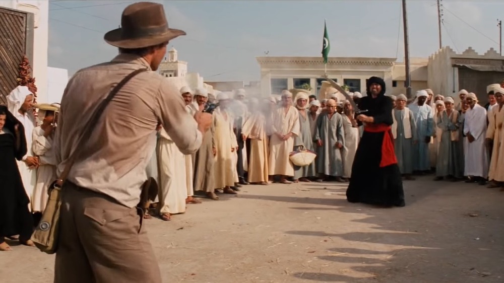 Indiana Jones shoots swordsman