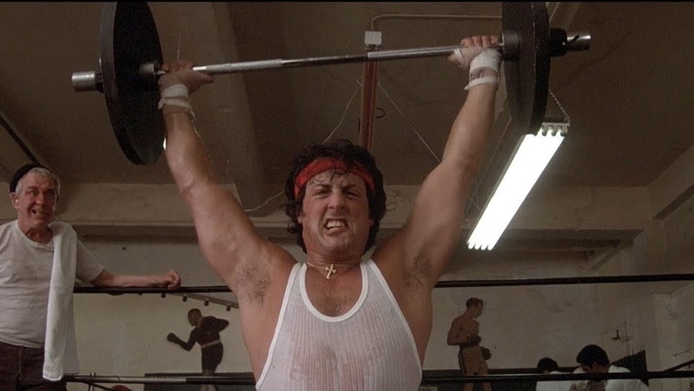 Rocky Balboa lifting weight