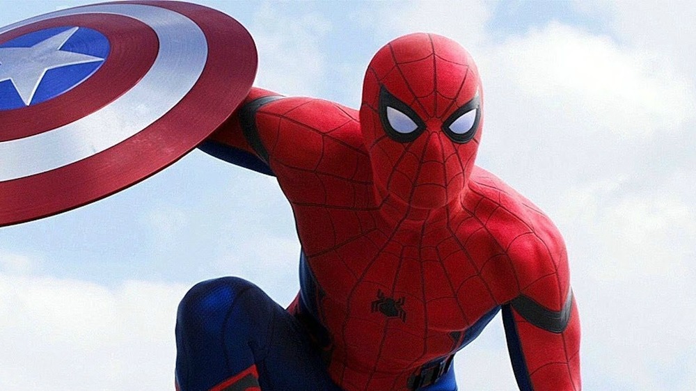 Spider-Man holding Cap's shield