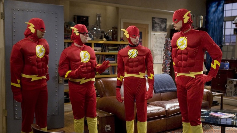 Four friends dressed as the Flash