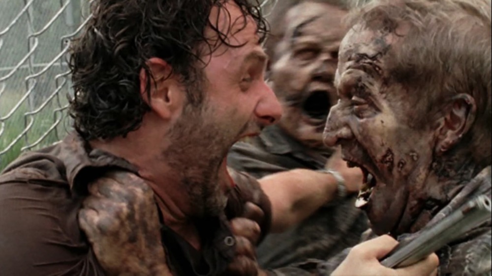 Rick Grimes fighting walker