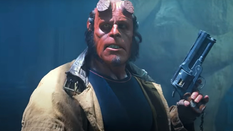 Ron Perlman's Hellboy holding gun