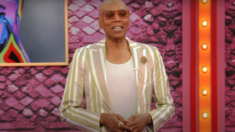 RuPaul Smiling on Drag Race in suit