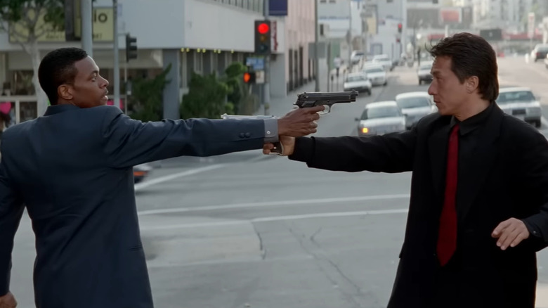 James Carter and Inspector Lee pointing guns