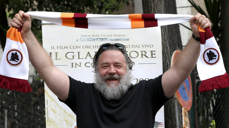 Russell Crowe with a football scarf