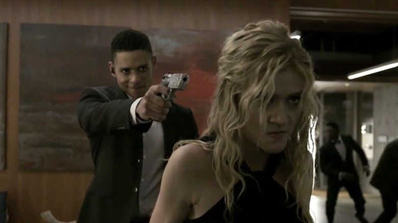 John Diggle Jr. holds gun to Mia's head