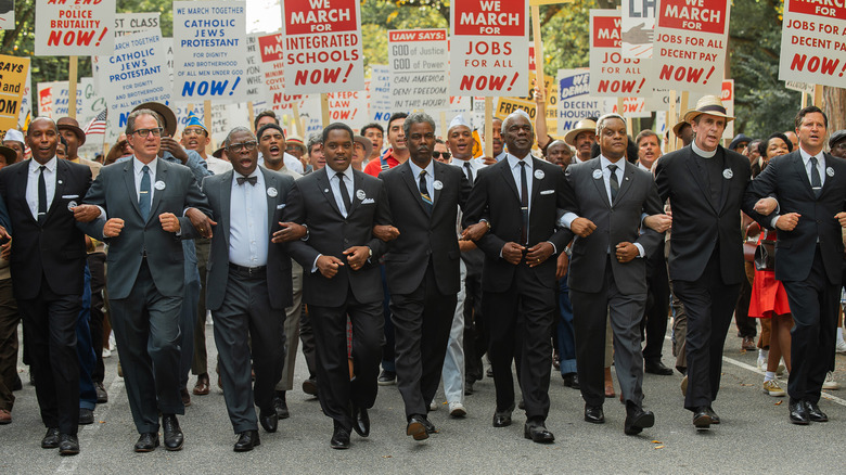 Civil rights marchers in street