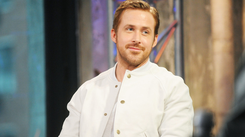 Ryan Gosling in white coat