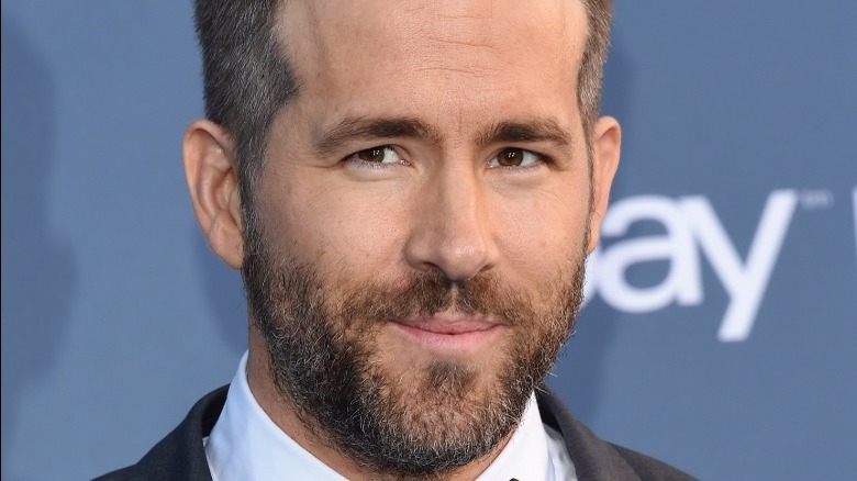 Ryan Reynolds looks contemplative