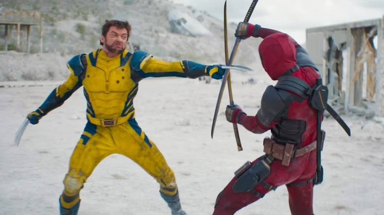 Wolverine fighting Deadpool