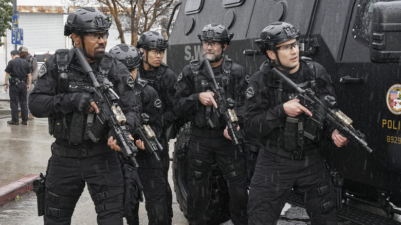 Hondo and SWAT team with rifles