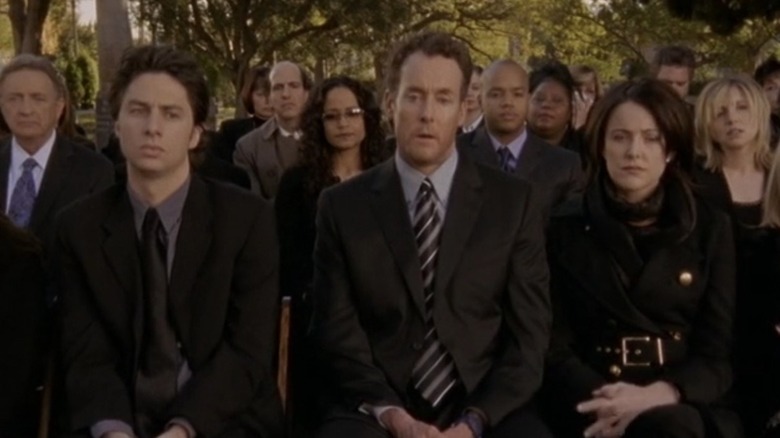 Dr. Cox at a funeral