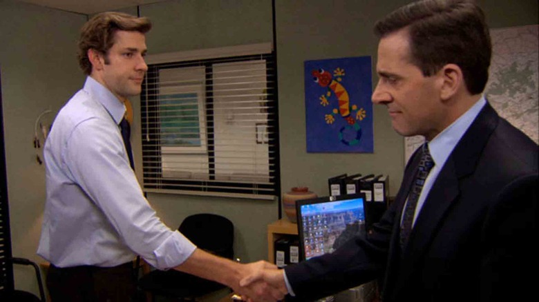 Jim and Michael shake hands