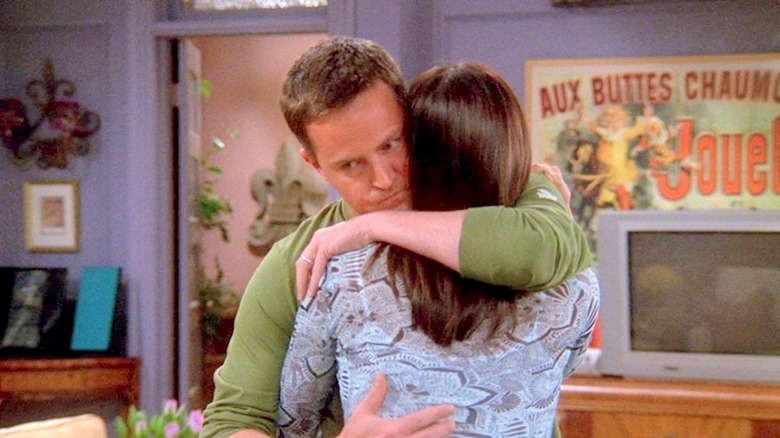 Monica and Chandler embrace