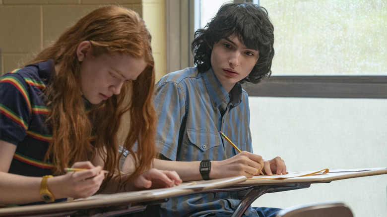 Max and Mike sitting in a classroom