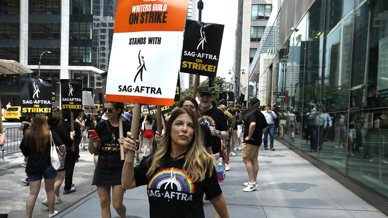 Picketer holding a sign