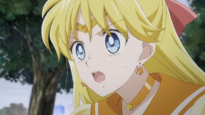 Sailor Venus wearing star headband, earings, and necklas