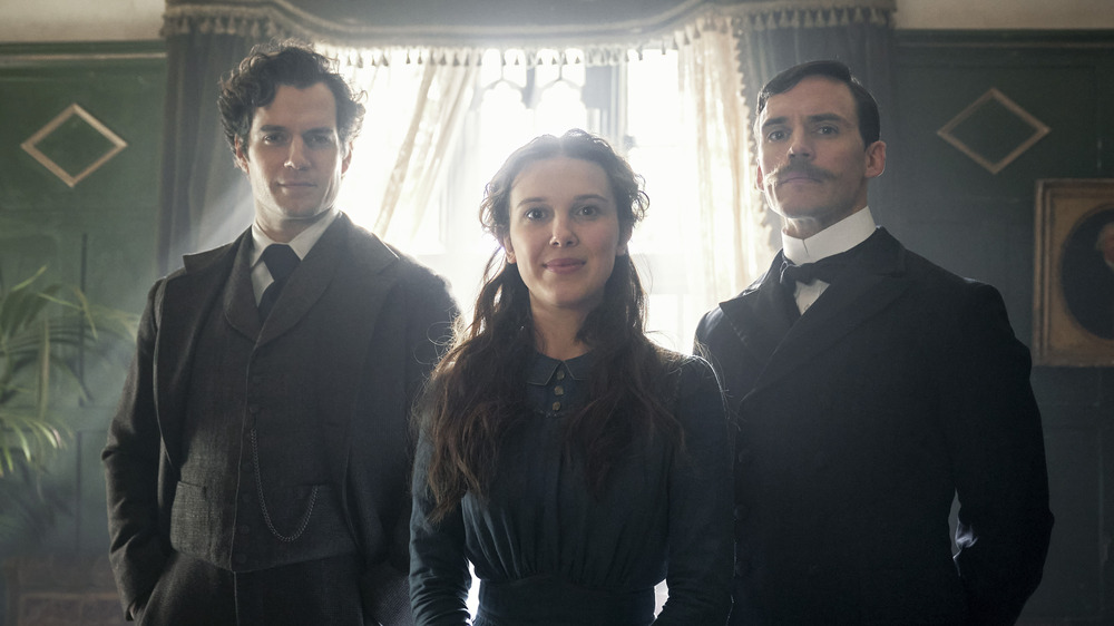 Henry Cavill, Millie Bobby Brown and Sam Clafin in Enola Holmes