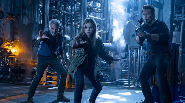 Alan Grant (Sam Neill), Maisie Lockwood (Isabella Sermon) and Owen Grady (Chris Pratt) in "Jurassic World: Dominion"