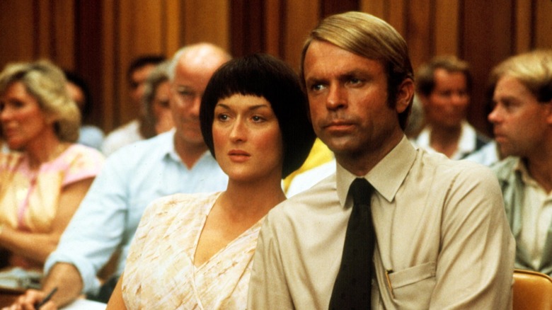 Sam Neill sits in court