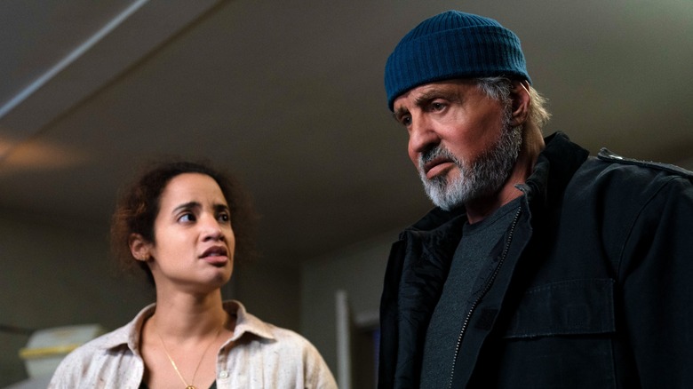 Dascha Polanco and Sylvester Stallone talking in "Samaritan"