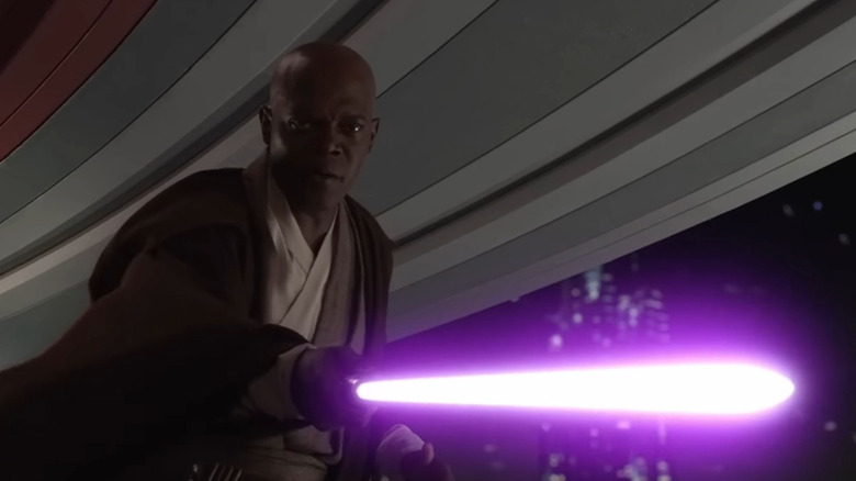 Mace holding lightsaber