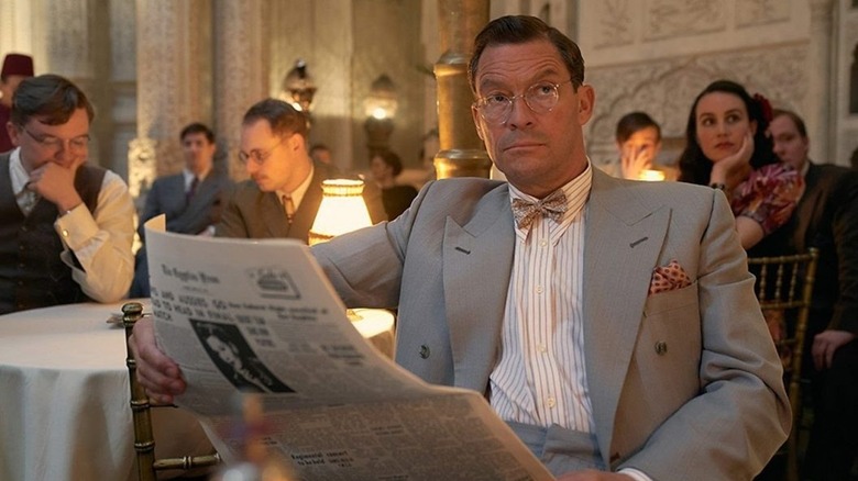 Dominic West reading newspaper in SAS: Rogue Heroes