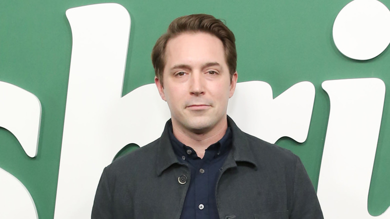 Beck Bennett neutral expression