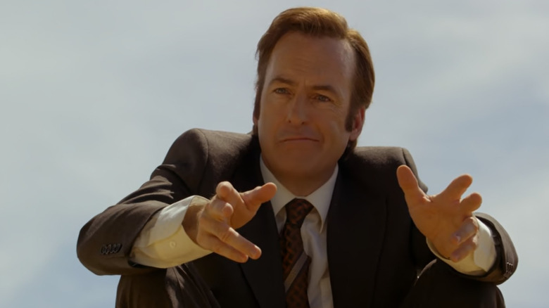 Jimmy McGill gestures while frowning 