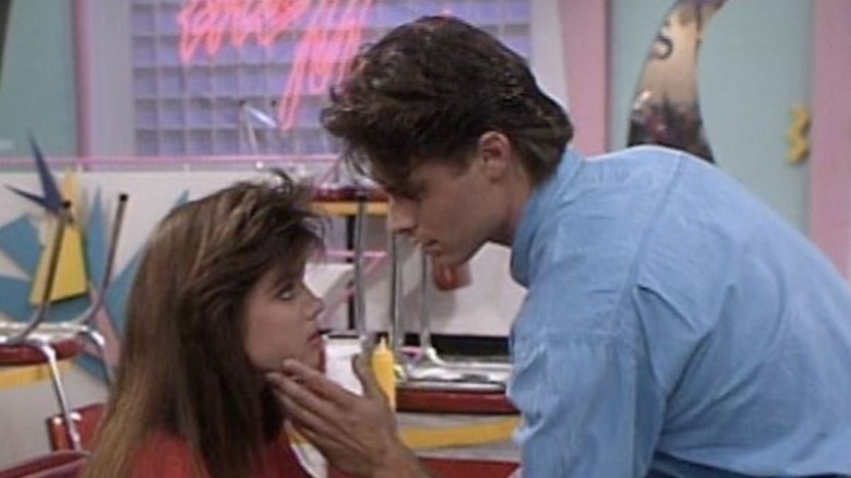 Tiffany Thiessen gazing up at Patrick Muldoon