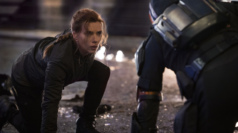 Black Widow Natasha kneeling on the street