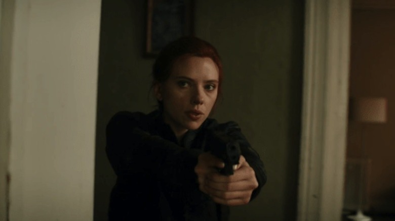 Scarlett Johansson Natasha Romanoff pointing gun