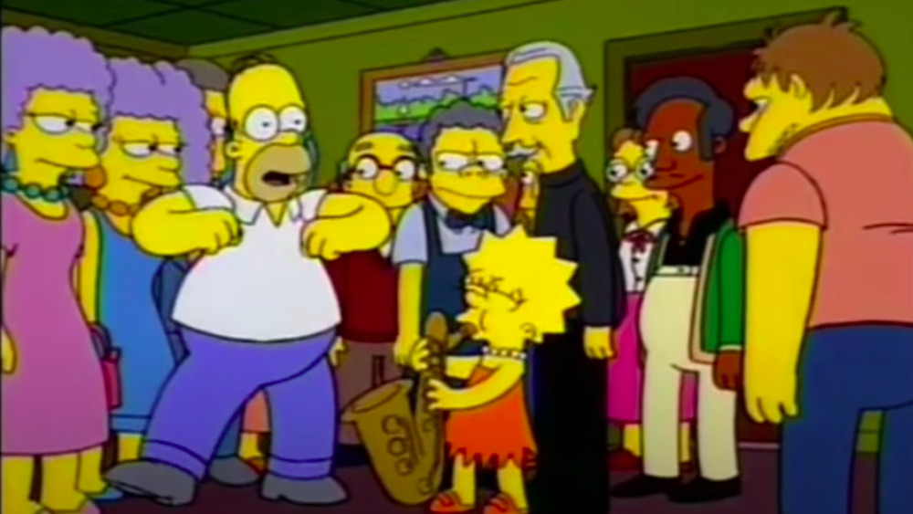 Homer dancing and Lisa playing saxophone
