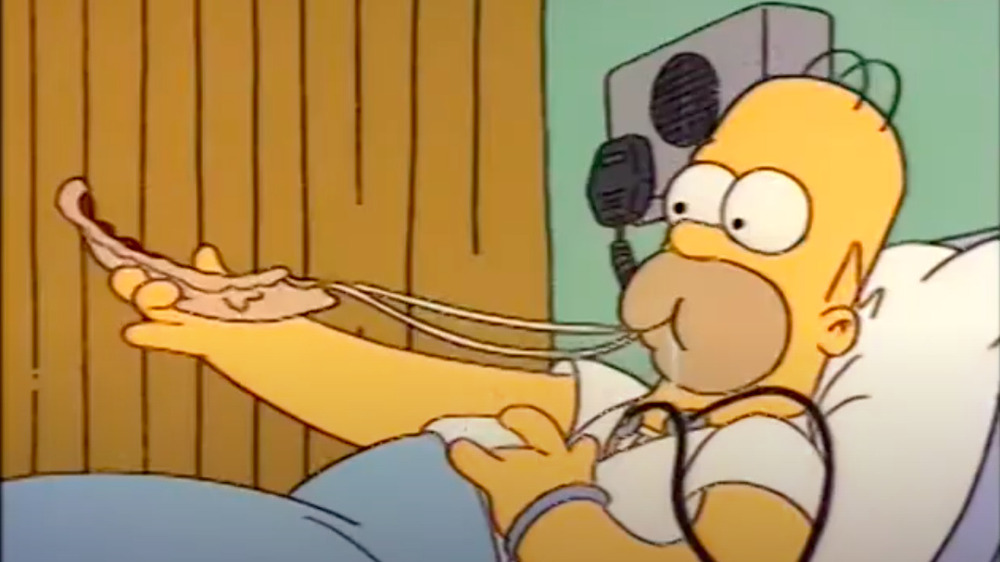 Homer eating pizza