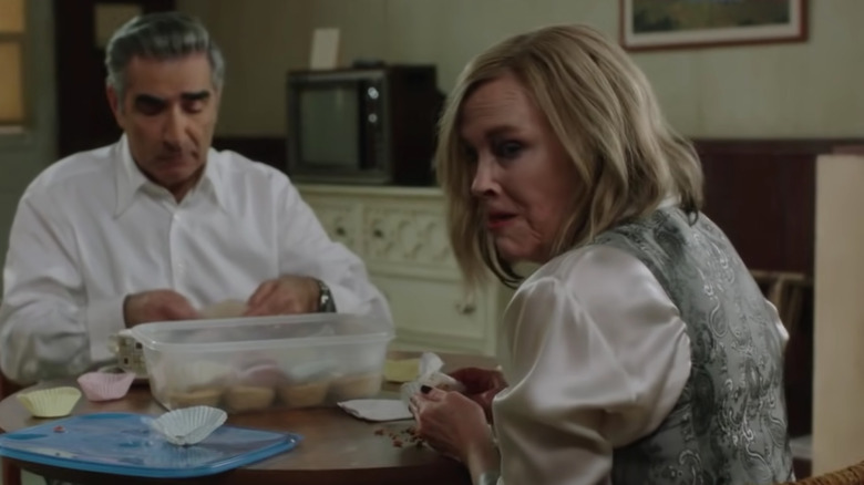 eugene levy and catherine o'hara eating cupcakes