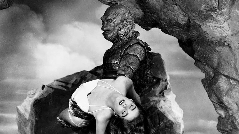 The Creature carries Julie Adams